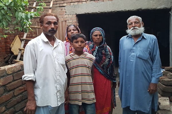 Amjad (l) and family