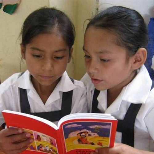 Peruvian Students Read ACNs Childrens Bible.jpg